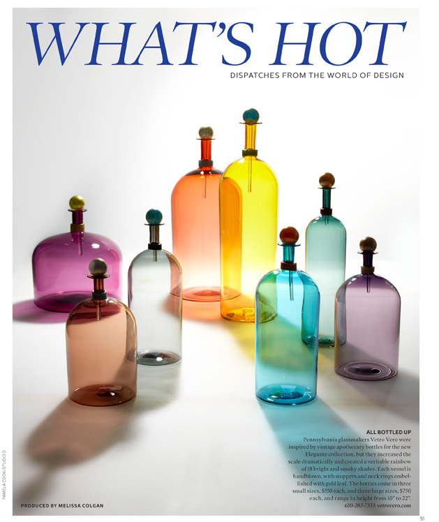 Image of colorful handblown glass bottles in Elle Decor what's hot.
