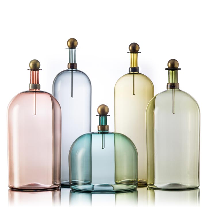 image of hand blown glass bottles in soft colors