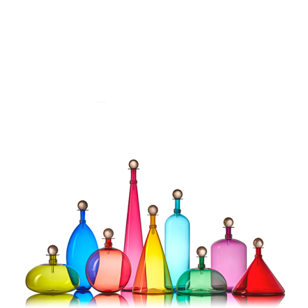image of handblown bottles in a rainbow of colors